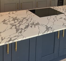 New Quartz called Arabescatto Corchia. 

We just fitted this today and we are expecting few more photos in the next few days, once the kitchen and flooring has been completed.: Click Here To View Larger Image